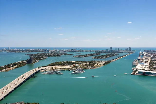 an aerial view of a city with lawn chairs