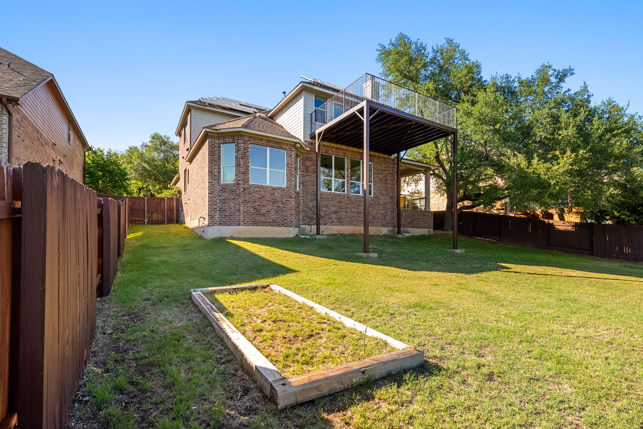 2708 Rio Mesa Drive Austin, TX 78732 - Photo 31 of 40 a view of a house with a yard