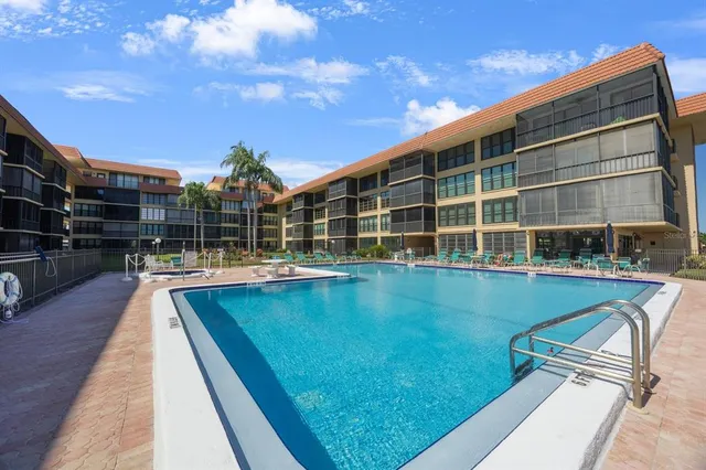 a view of a lake with a yard