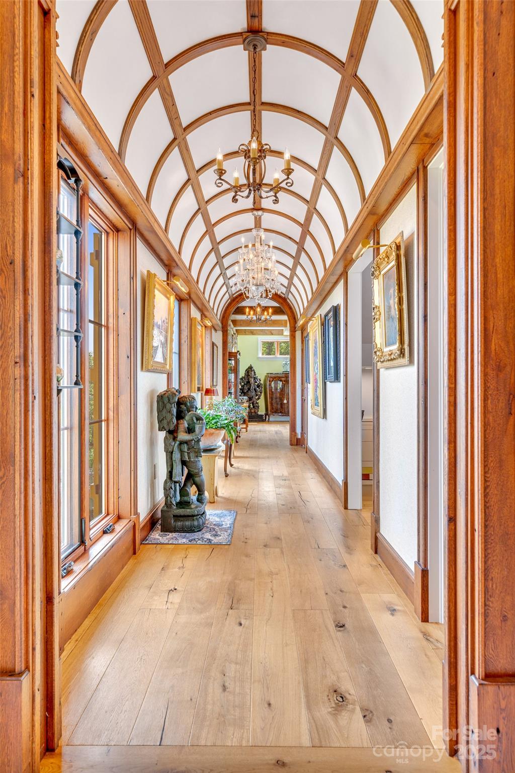 278 North Snow Ridge Drive Fairview, NC 28730 - Photo 15 of 48 a view of an entryway with a floor to ceiling window and a living room
