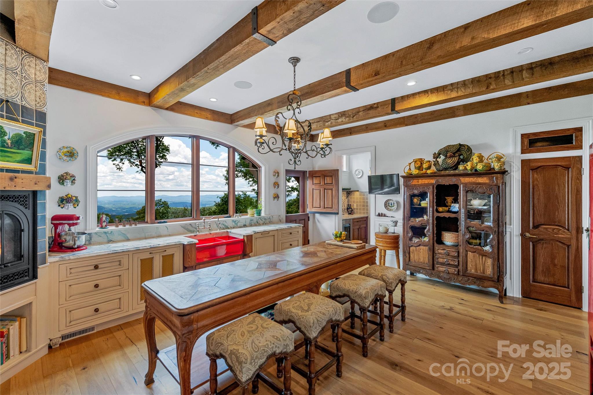 278 North Snow Ridge Drive Fairview, NC 28730 - Photo 19 of 48 a view of a dining room with furniture and chandelier