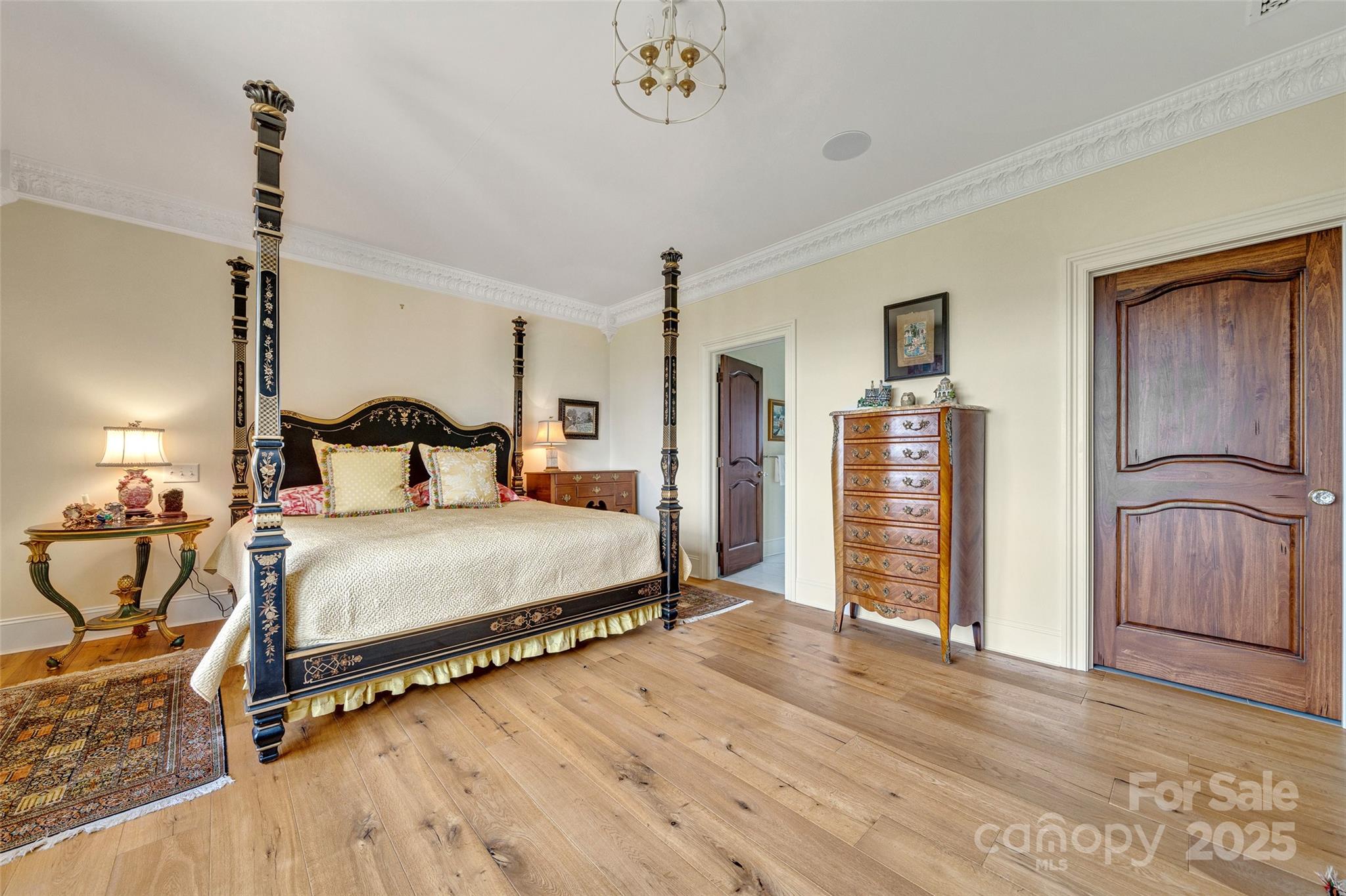 278 North Snow Ridge Drive Fairview, NC 28730 - Photo 26 of 48 a bedroom with a bed and a table