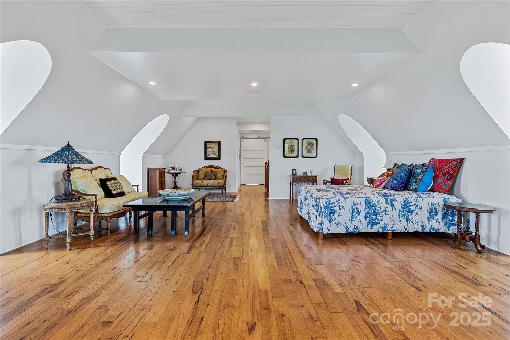 278 North Snow Ridge Drive Fairview, NC 28730 - Photo 31 of 48 a living room with furniture and wooden floor