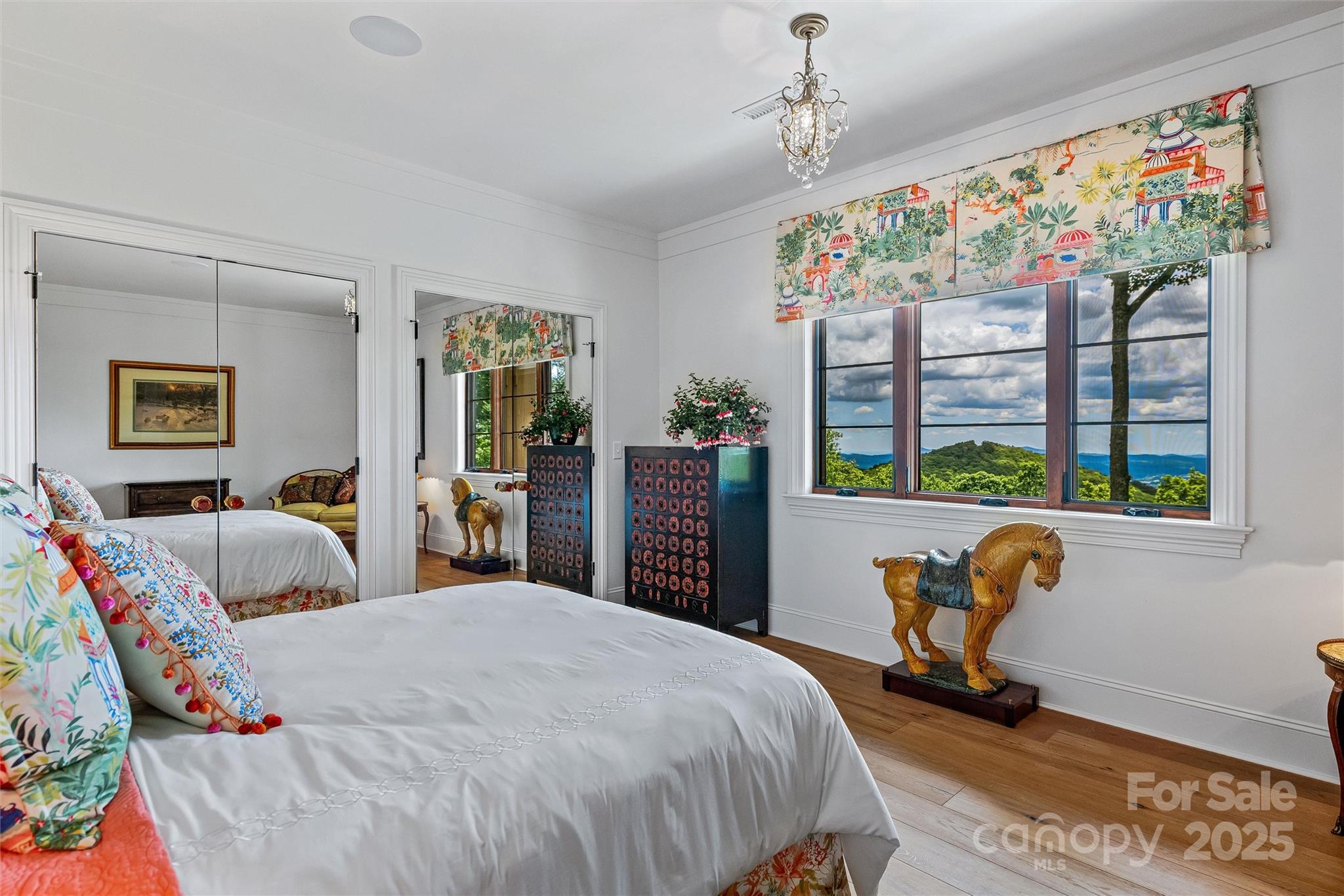 278 North Snow Ridge Drive Fairview, NC 28730 - Photo 36 of 48 a bedroom with a bed and a window