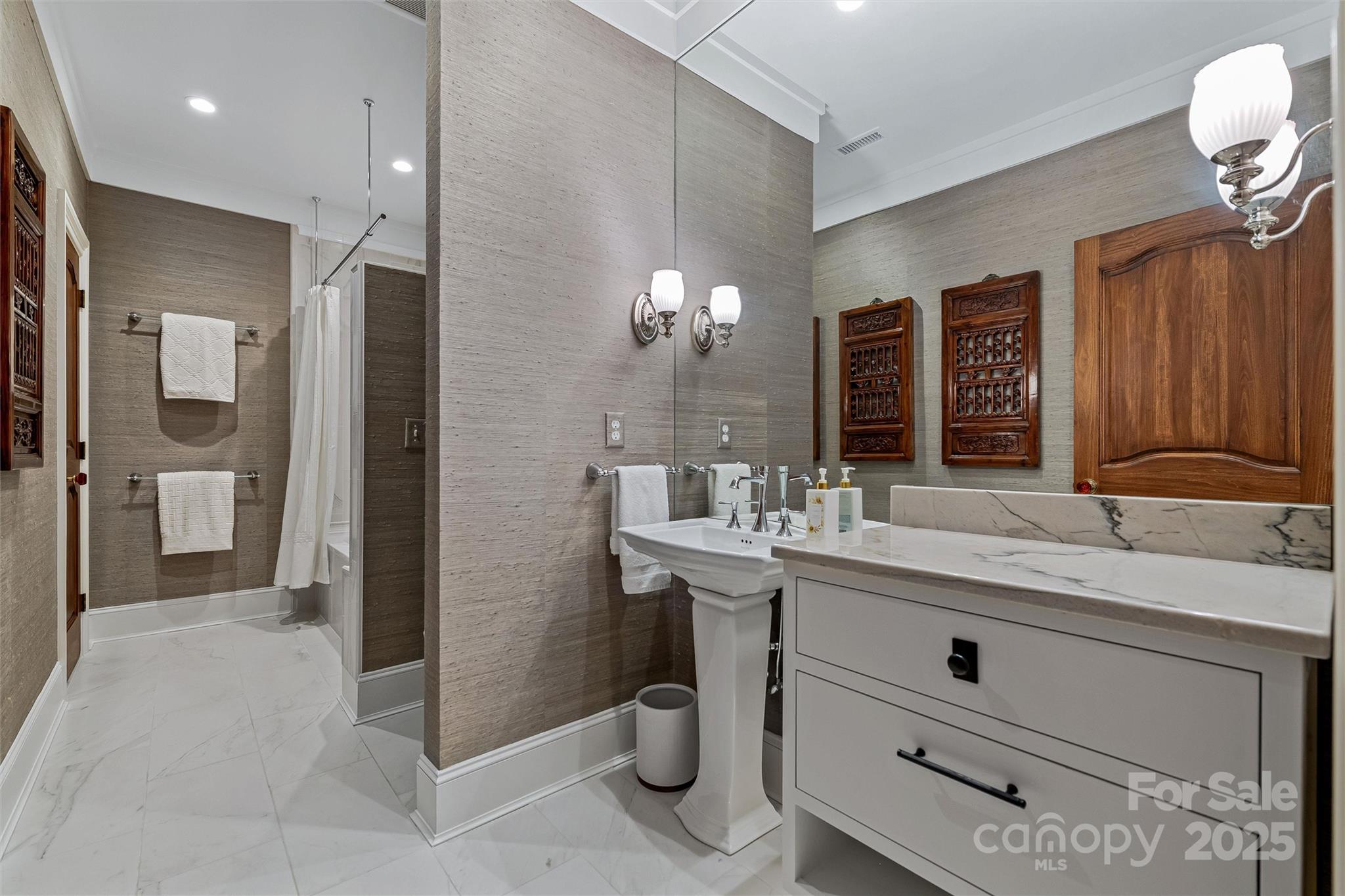 278 North Snow Ridge Drive Fairview, NC 28730 - Photo 38 of 48 a bathroom with a sink double vanity and a mirror