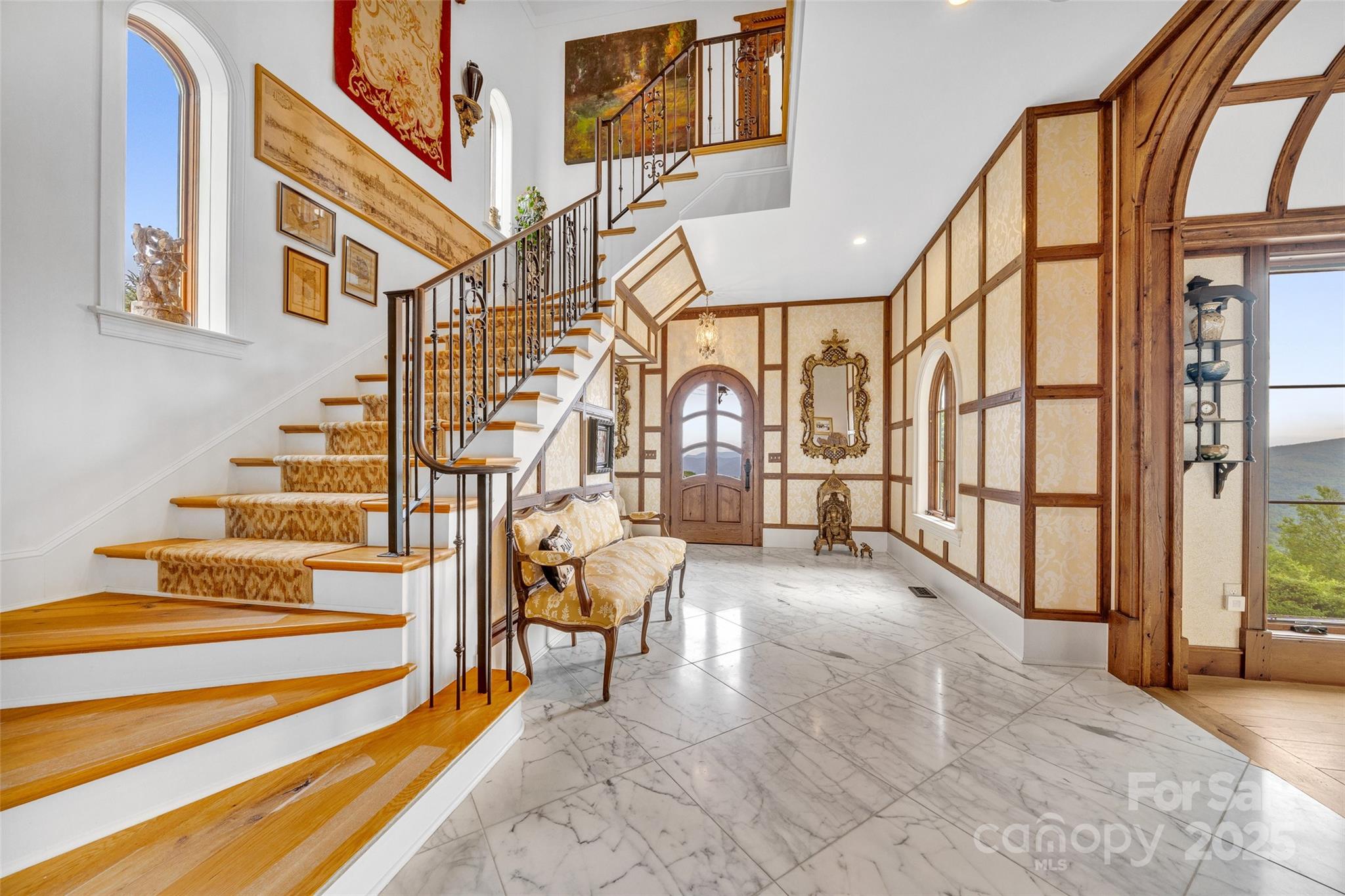 278 North Snow Ridge Drive Fairview, NC 28730 - Photo 7 of 48 a view of entryway and hall with wooden floor