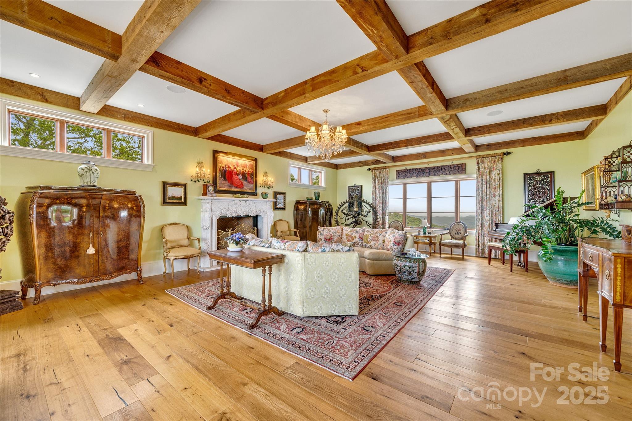 278 North Snow Ridge Drive Fairview, NC 28730 - Photo 8 of 48 a living room with fireplace furniture and a large window