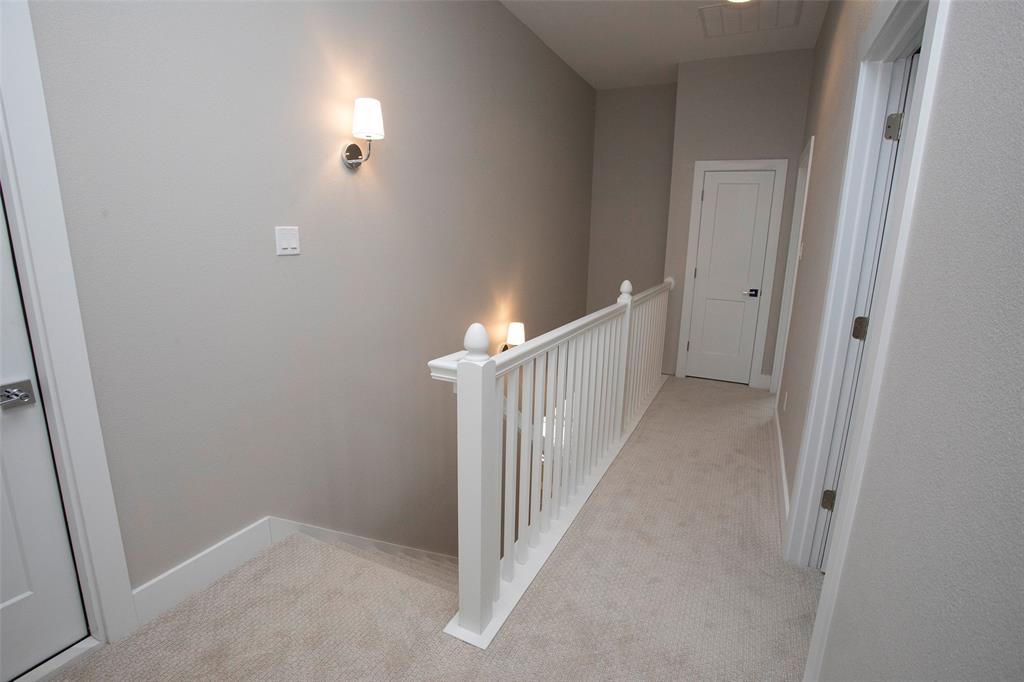 1185 Green Elm Road Graford, TX 76449 - Photo 15 of 25 Upstairs entrance to attic storage and 2 bedrooms/baths