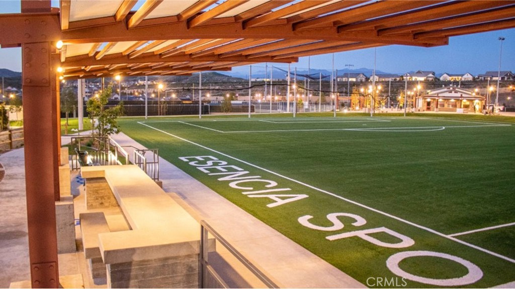 203 Bounty Road Rancho Mission Viejo, CA 92694 - Photo 7 of 10 a view of a tennis ground with large trees