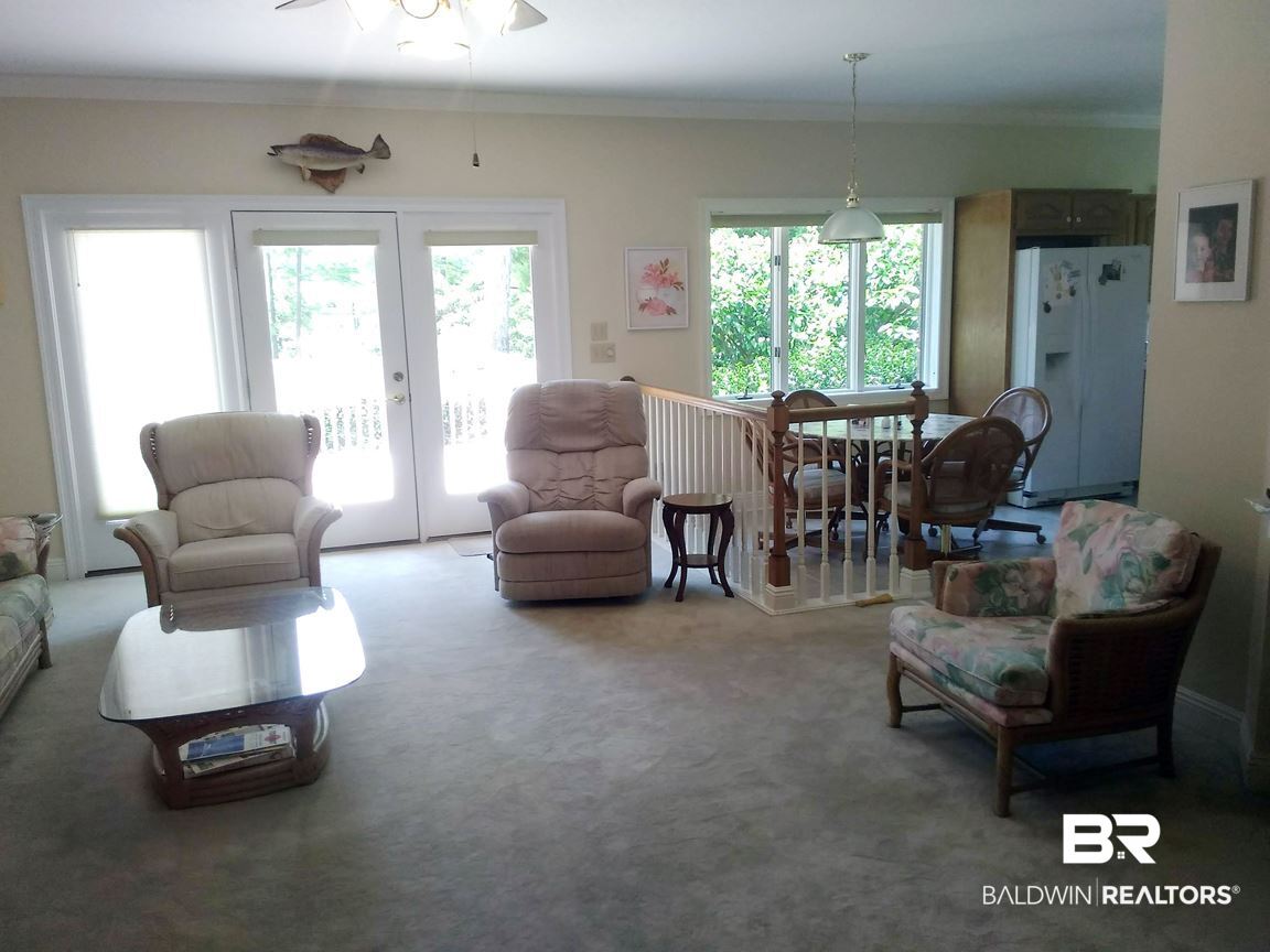 8132 Bay View Drive Foley, AL 36535 - Photo 15 of 50 Den toward kitchen