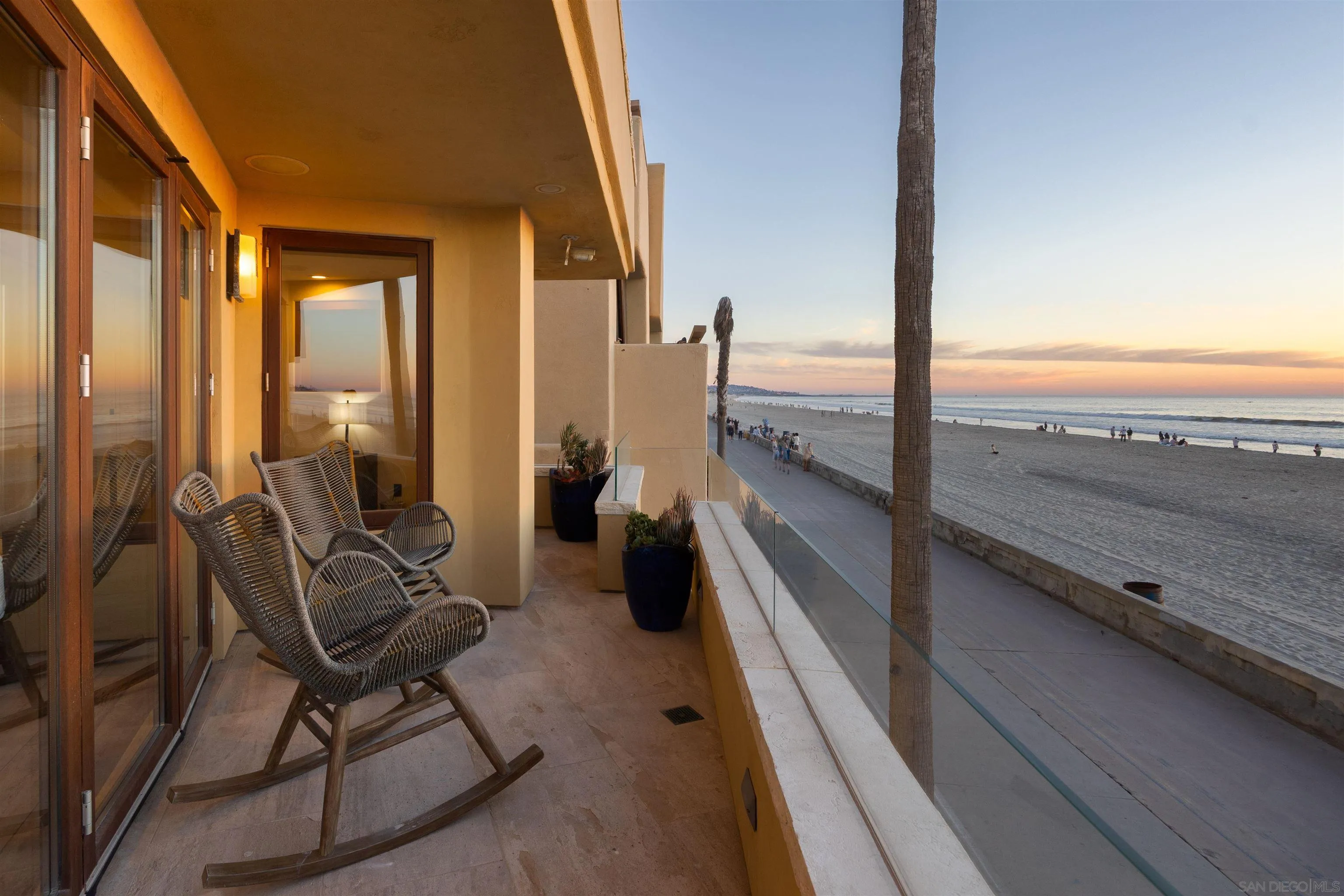 3921 Ocean Front Walk San Diego, CA 92109 - Photo 17 of 32 a view of a balcony with chairs