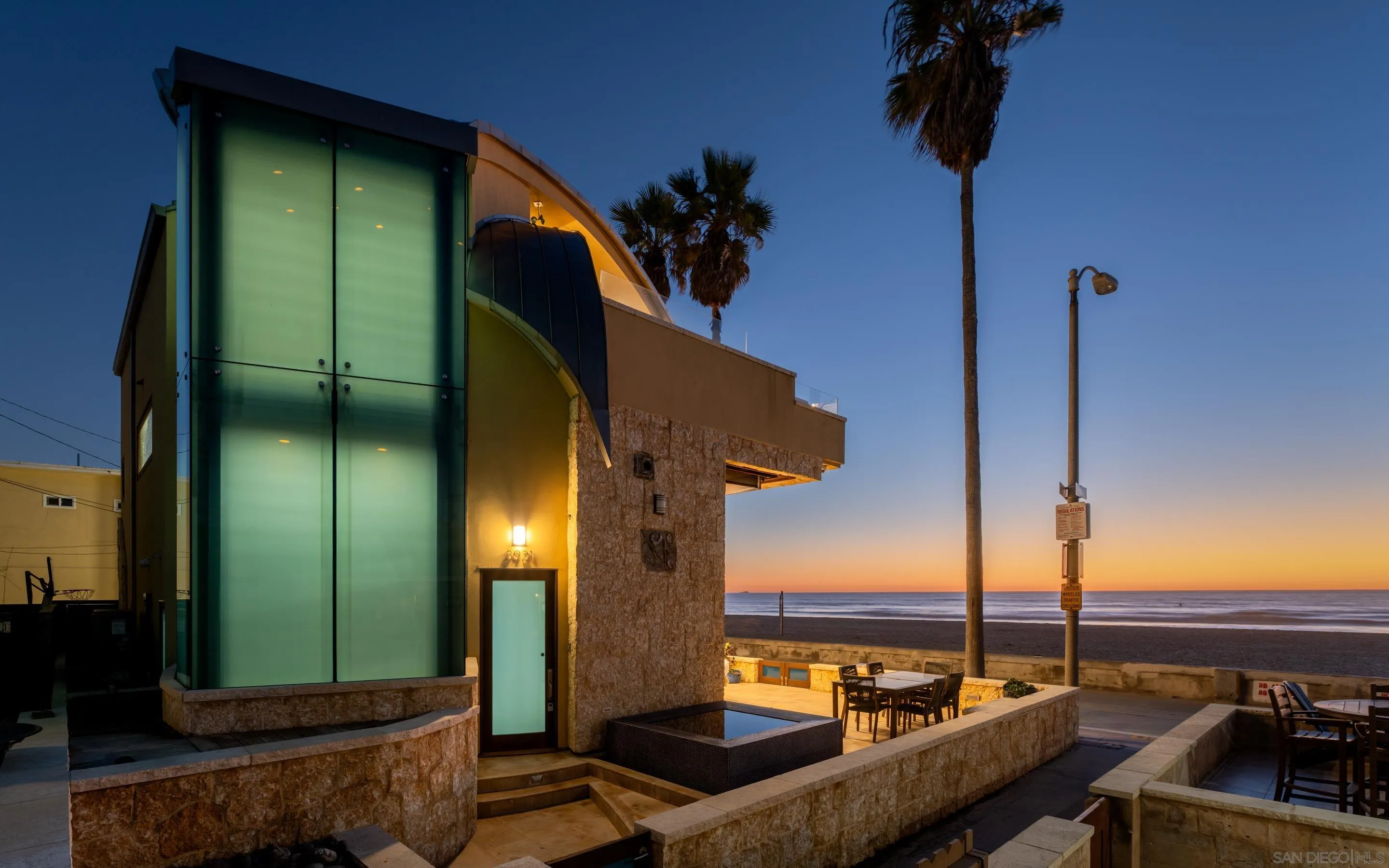 3921 Ocean Front Walk San Diego, CA 92109 - Photo 30 of 32 a view of a balcony with furniture and a potted plant