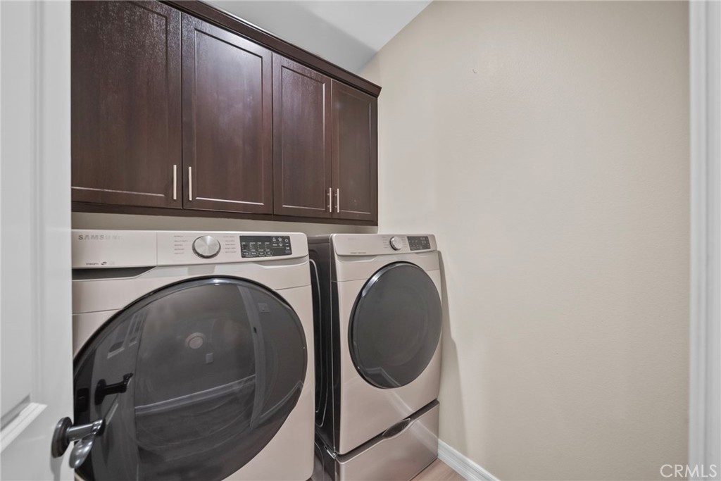 4066 Aurora Way Piru, CA 93040 - Photo 16 of 47 Laundry room with cabinets