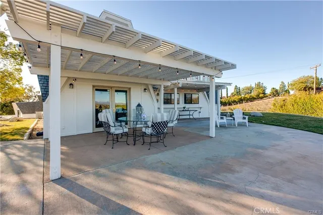 a view of a balcony with an ocean view