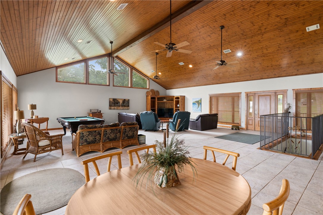 10959 Clyde Acord Road Franklin, TX 77856 - Photo 16 of 44 a living room with furniture kitchen view and a large window