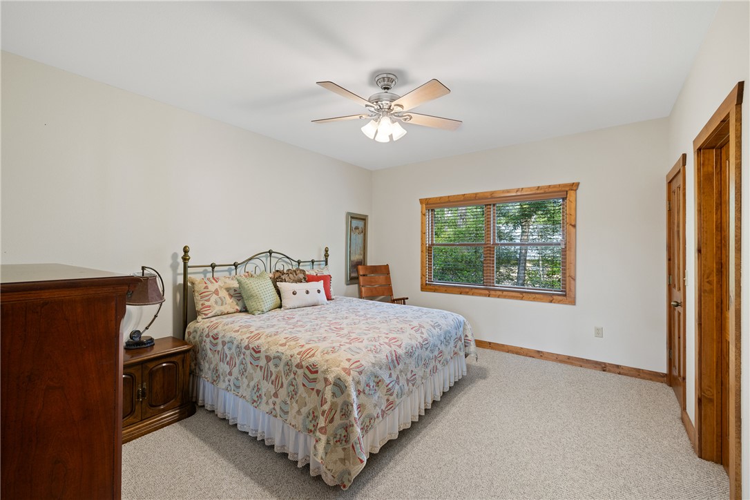 10959 Clyde Acord Road Franklin, TX 77856 - Photo 22 of 44 a bedroom with a bed and a window