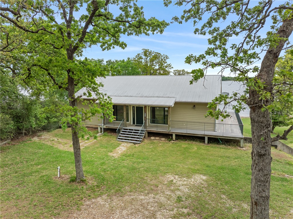 10959 Clyde Acord Road Franklin, TX 77856 - Photo 42 of 44 an aerial view of a house with swimming pool garden and patio