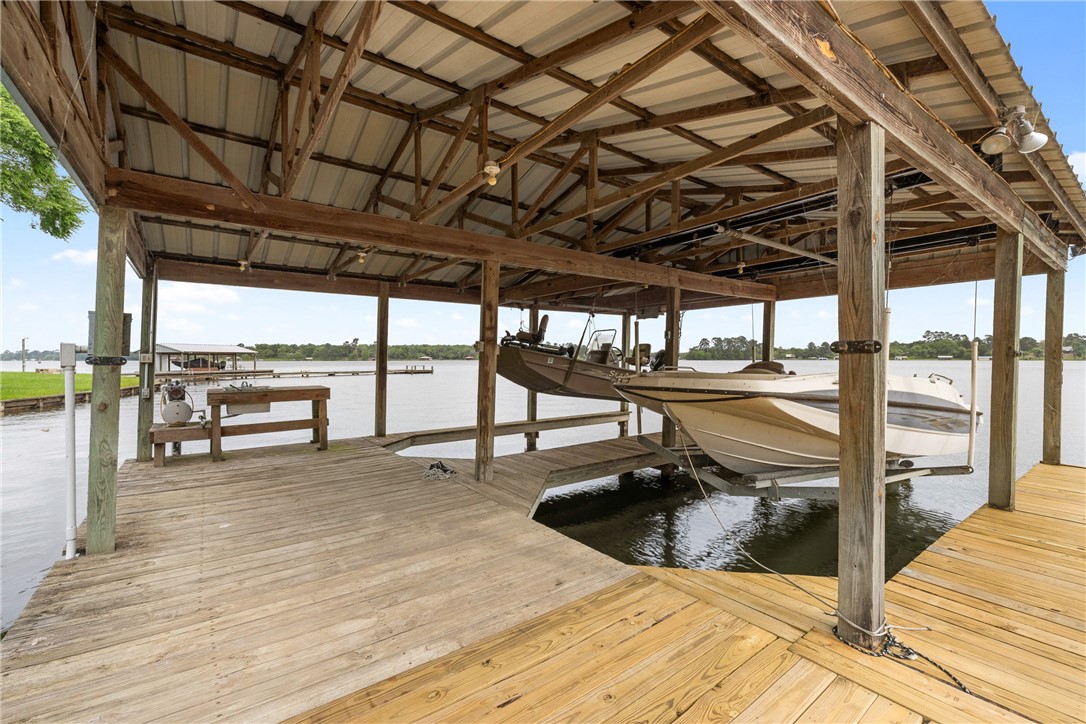 10959 Clyde Acord Road Franklin, TX 77856 - Photo 8 of 44 a view of a swimming pool with a patio