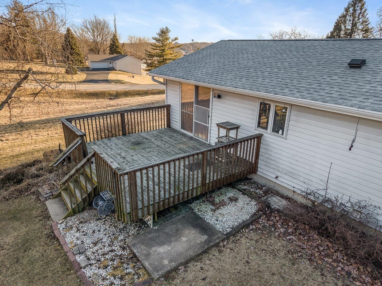 1092 Winborne Road Lake Summerset, IL 61019 - Photo 29 of 34 a view of a house with a wooden deck