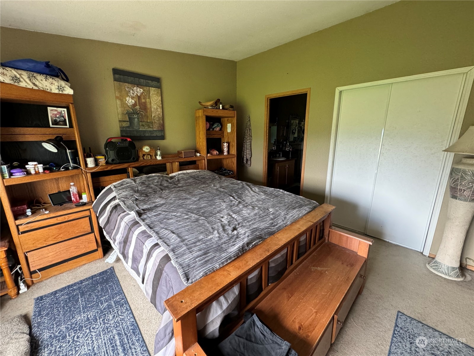 5517 Rock Road Sumas, WA 98295 - Photo 8 of 16 a bed sitting in a bedroom and mirror