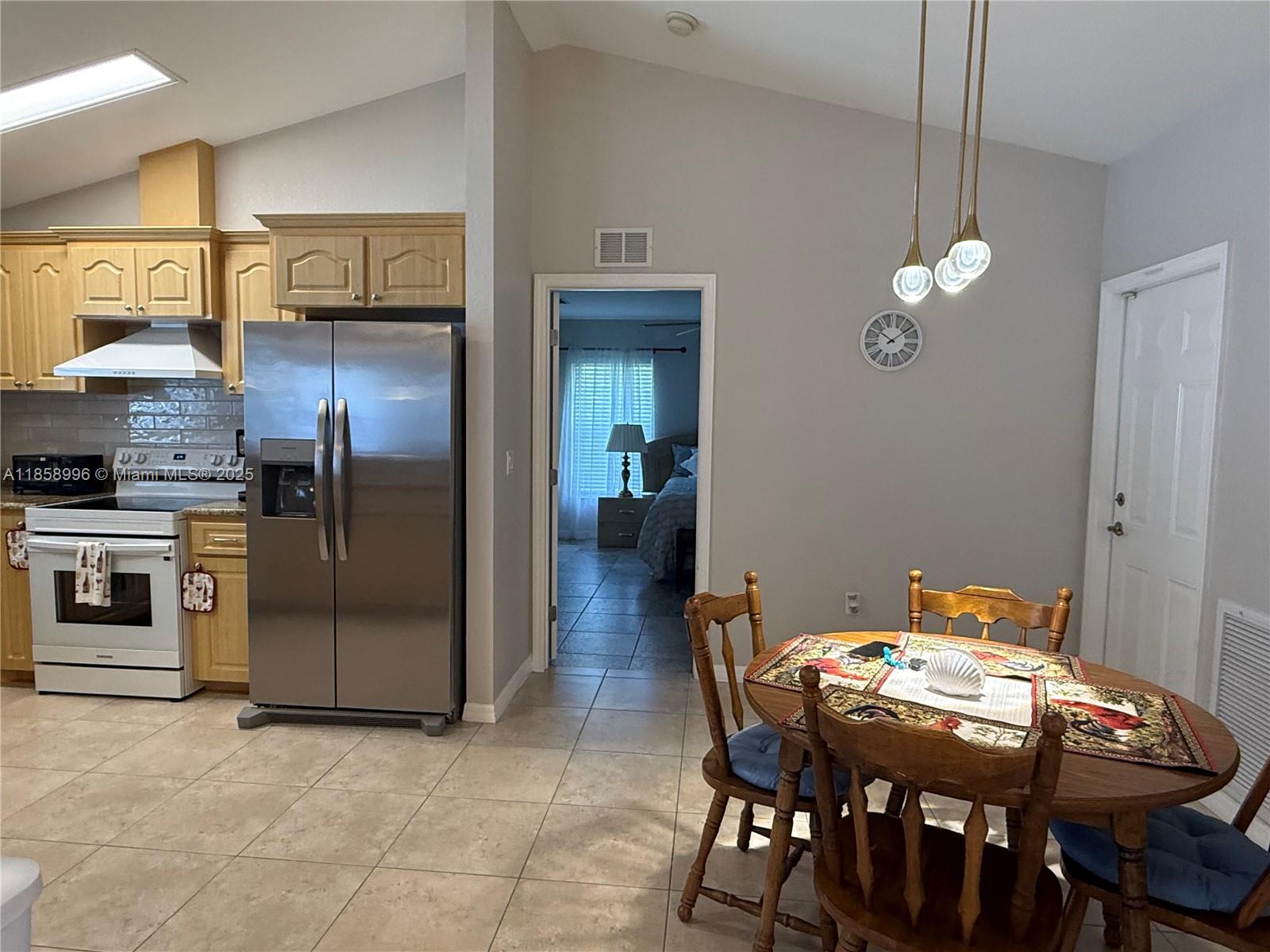 4115 Hammock Road Sebring, FL 33875 - Photo 13 of 25 a view of a dining room with furniture