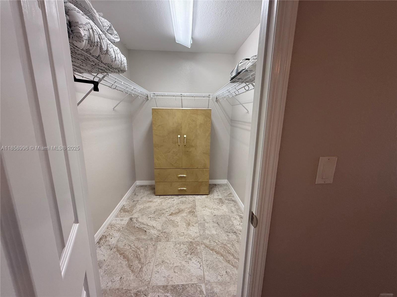 4115 Hammock Road Sebring, FL 33875 - Photo 19 of 25 a bathroom with a sink and shower