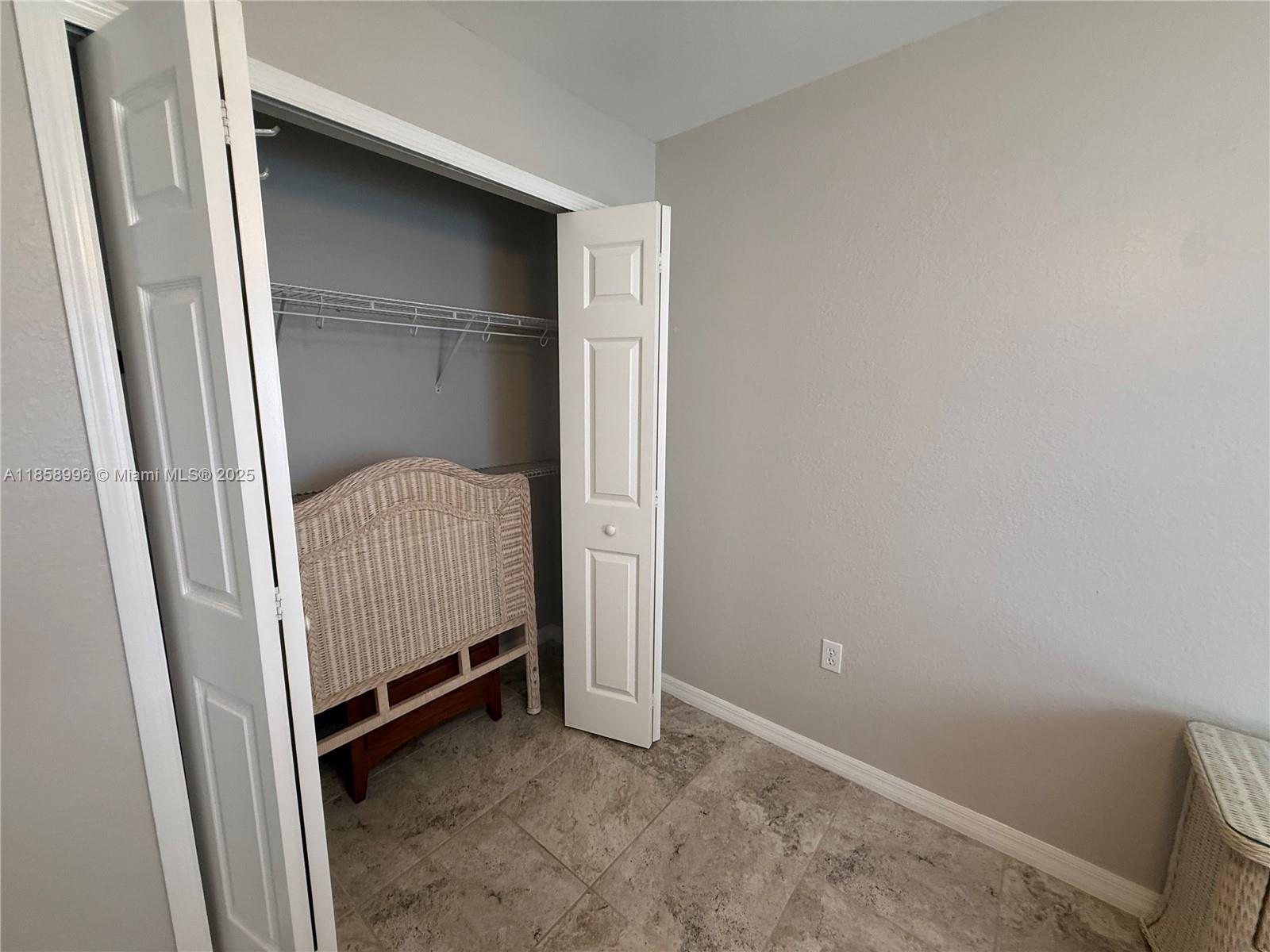 4115 Hammock Road Sebring, FL 33875 - Photo 21 of 25 a view of a room with a door