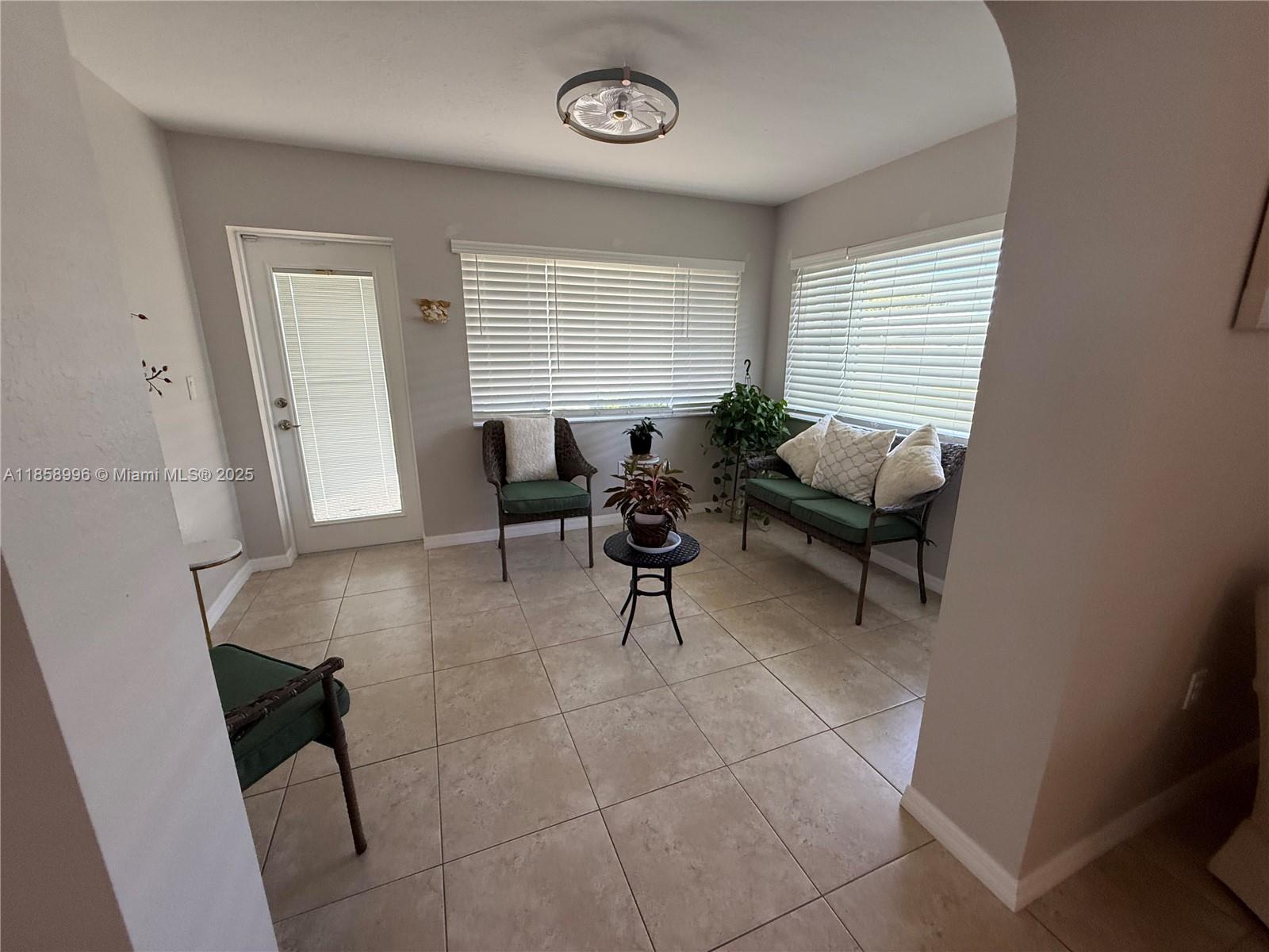 4115 Hammock Road Sebring, FL 33875 - Photo 24 of 25 a living room with furniture and a window