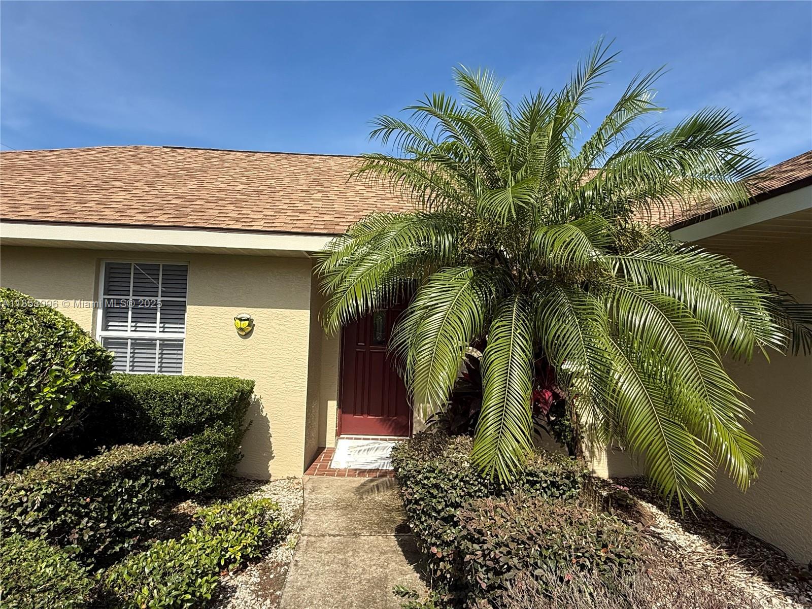 4115 Hammock Road Sebring, FL 33875 - Photo 3 of 25 a view of a house with a yard