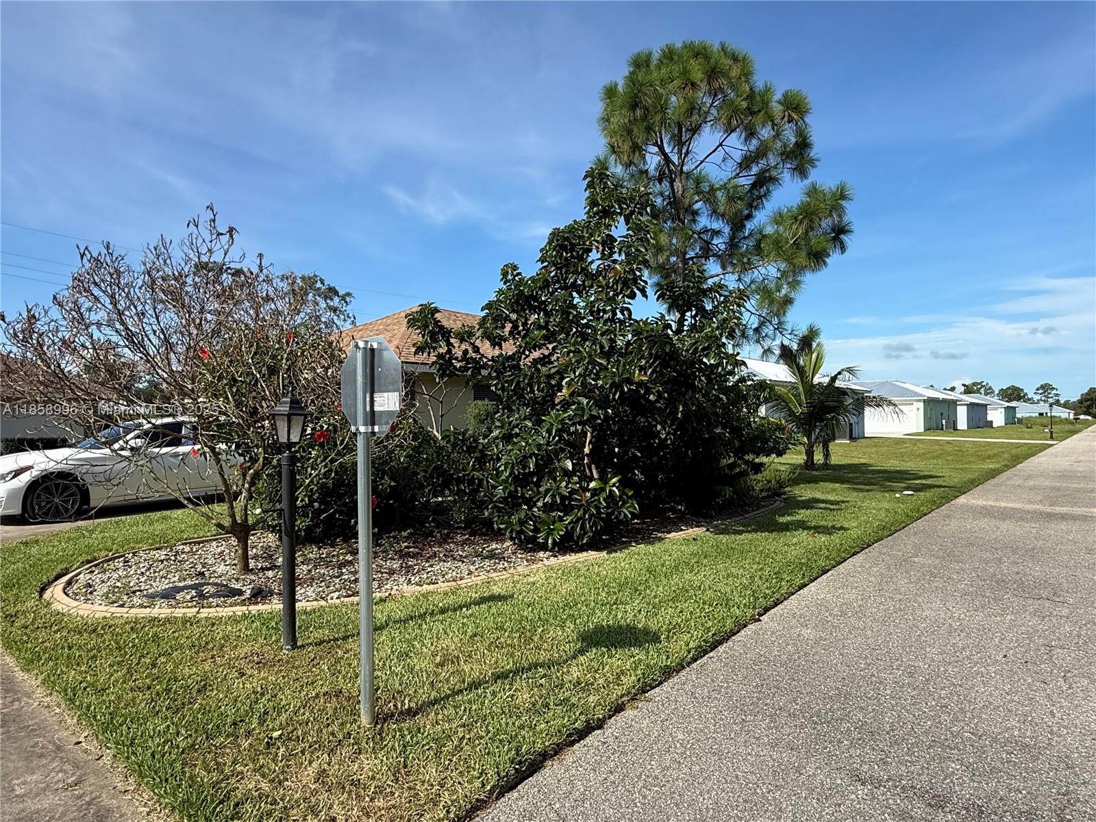 4115 Hammock Road Sebring, FL 33875 - Photo 9 of 25 a view of a park with large trees