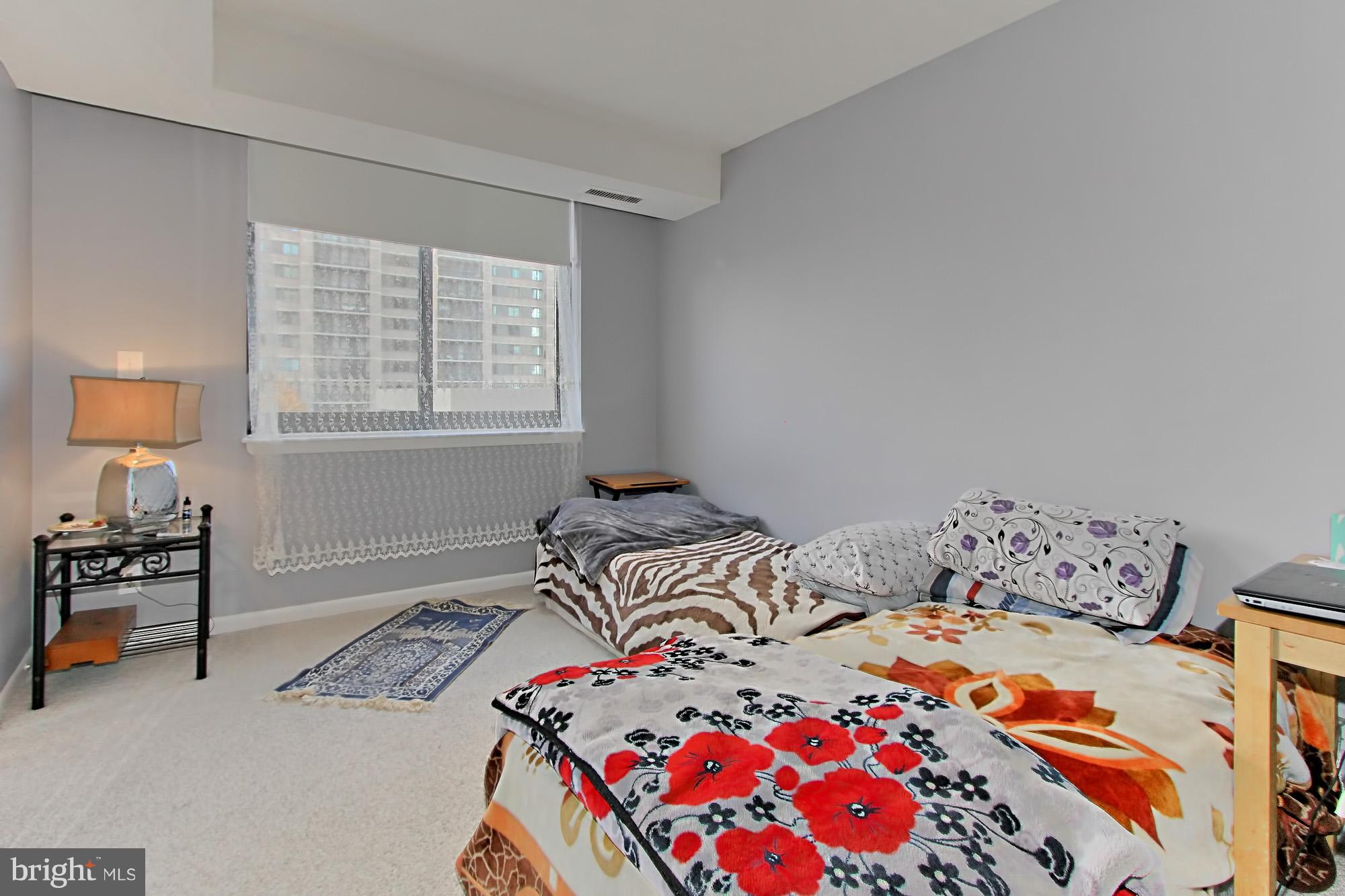 5501 Seminary Road, Unit 314S Falls Church, VA 22041 - Photo 16 of 30 a bedroom with a bed and a window