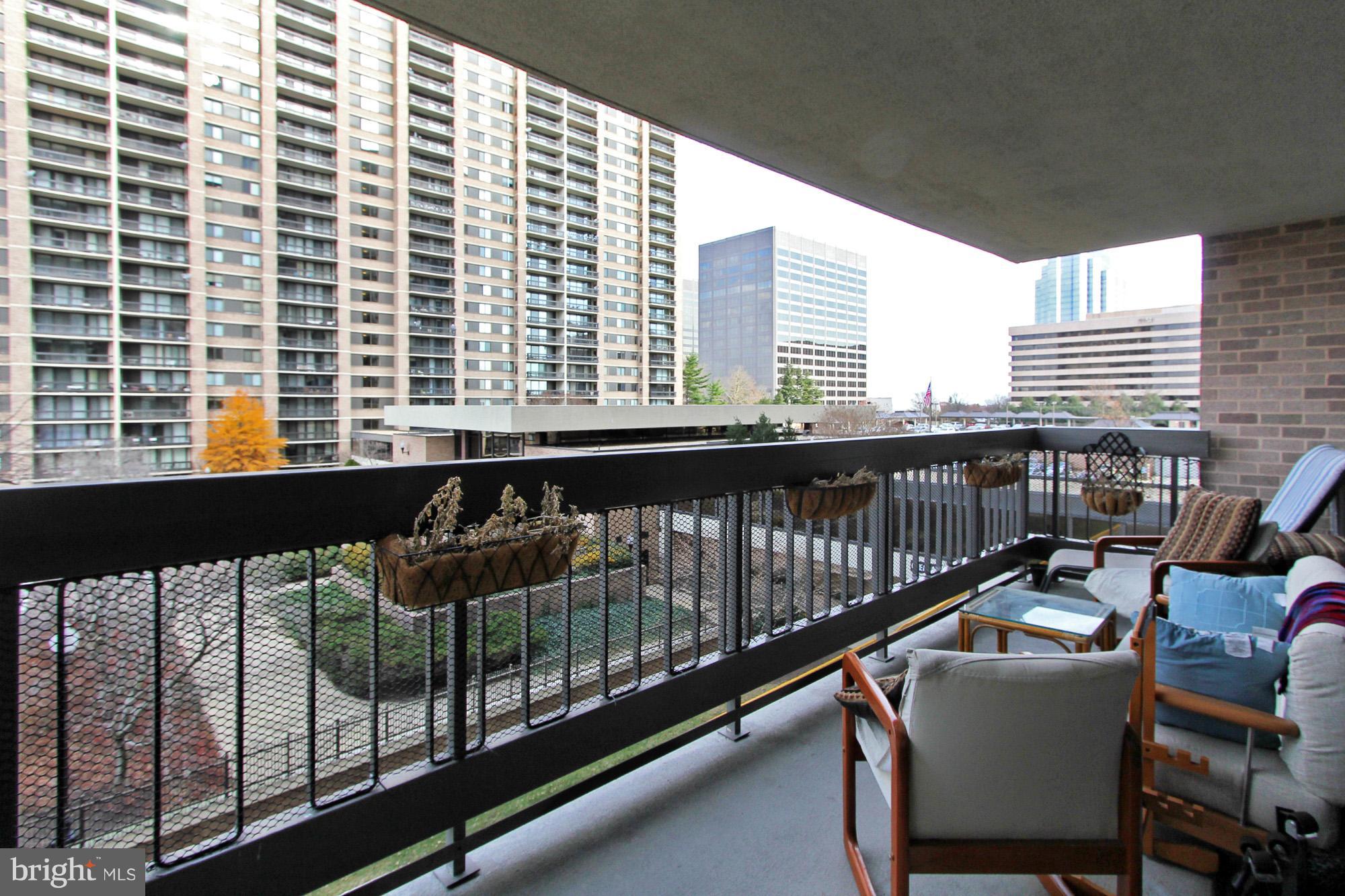 5501 Seminary Road, Unit 314S Falls Church, VA 22041 - Photo 23 of 30 a view of a balcony with furniture