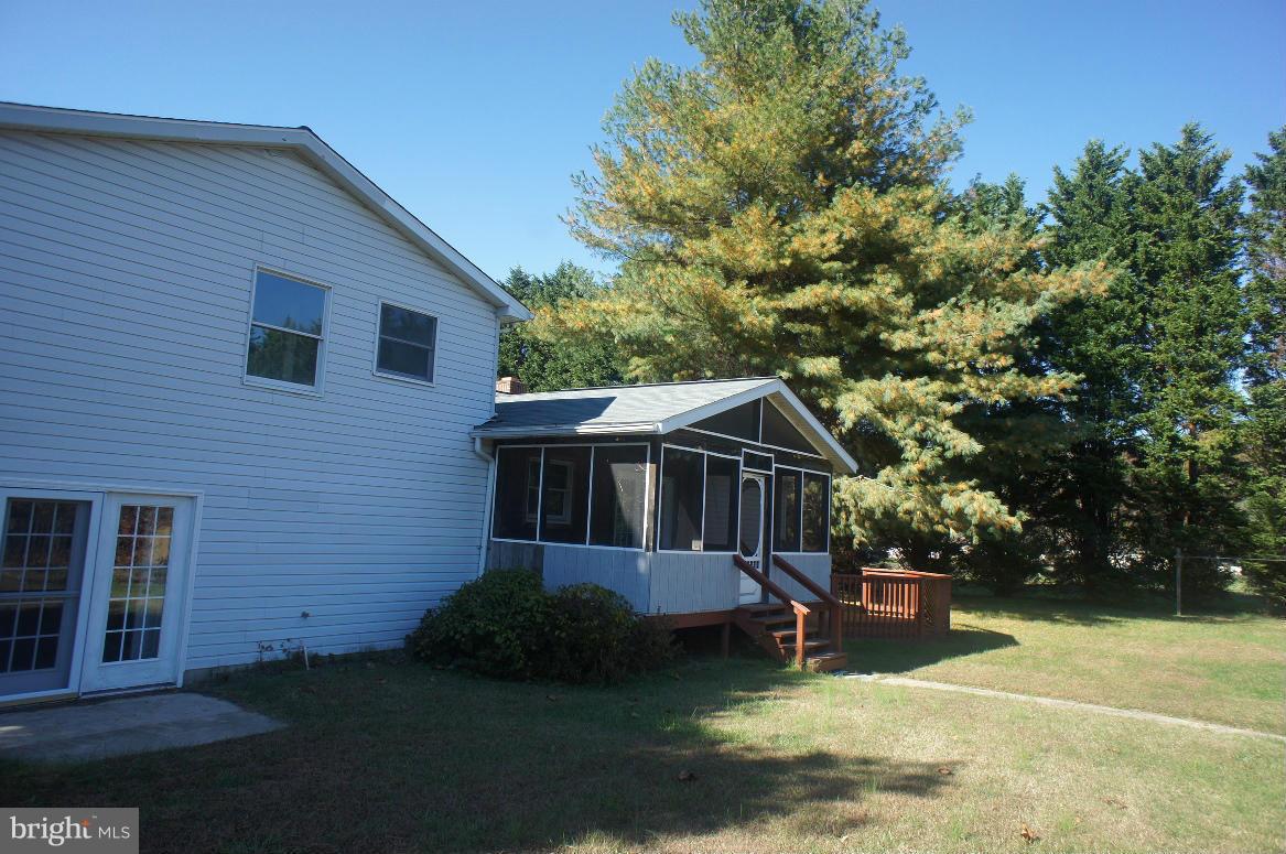 3042 Soper Road Huntingtown, MD 20639 - Photo 2 of 15 a view of a house with a yard