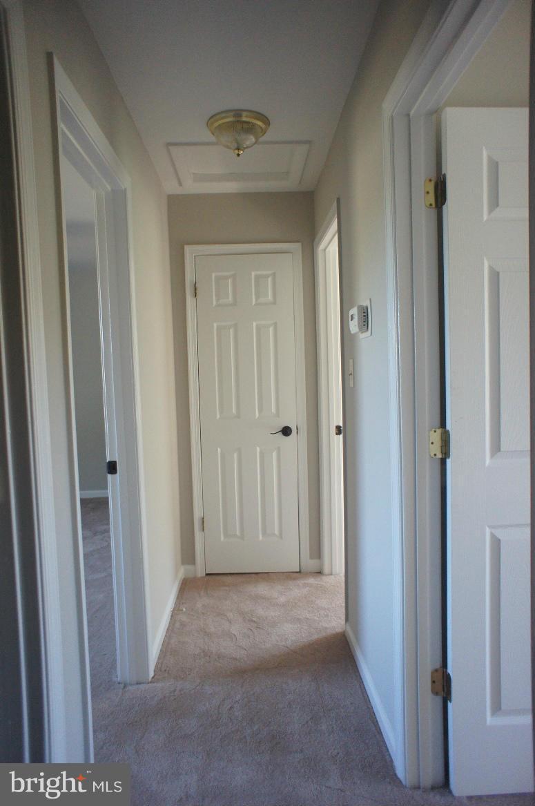 3042 Soper Road Huntingtown, MD 20639 - Photo 11 of 15 a view of a hallway with closet area