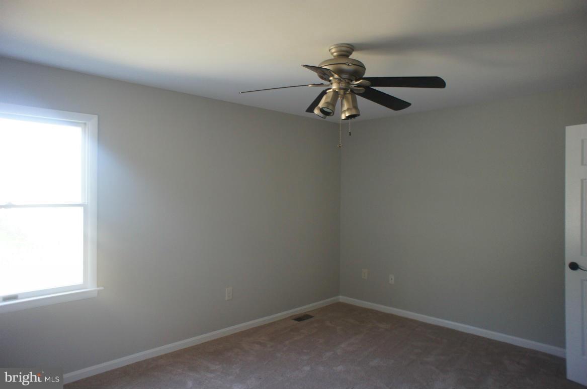 3042 Soper Road Huntingtown, MD 20639 - Photo 14 of 15 an empty room with a window