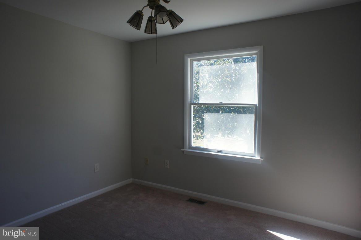 3042 Soper Road Huntingtown, MD 20639 - Photo 4 of 15 an empty room with a window