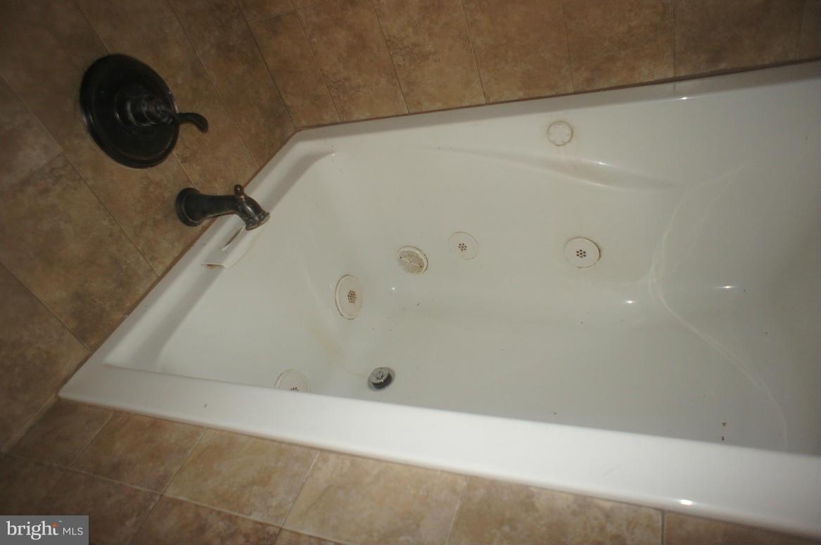 3042 Soper Road Huntingtown, MD 20639 - Photo 7 of 15 view of a bathtub in a bathroom