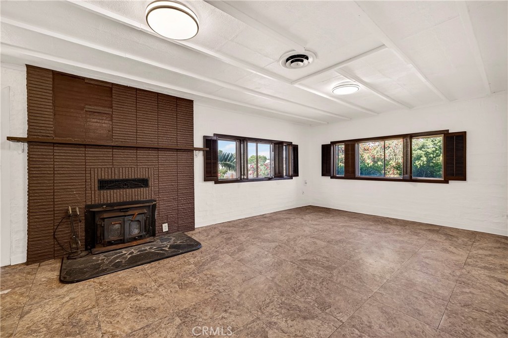 351 2nd Street Hamilton City, CA 95951 - Photo 12 of 52 an empty room with windows and fireplace