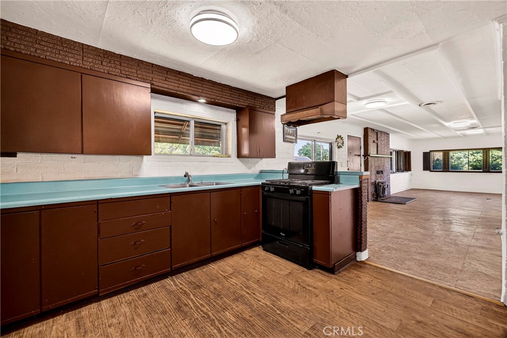 351 2nd Street Hamilton City, CA 95951 - Photo 15 of 52 a kitchen with stainless steel appliances granite countertop a stove and a sink