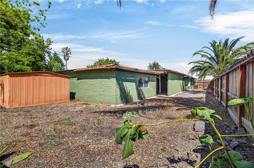 351 2nd Street Hamilton City, CA 95951 - Photo 37 of 52 a view of a house with wooden walls and a yard