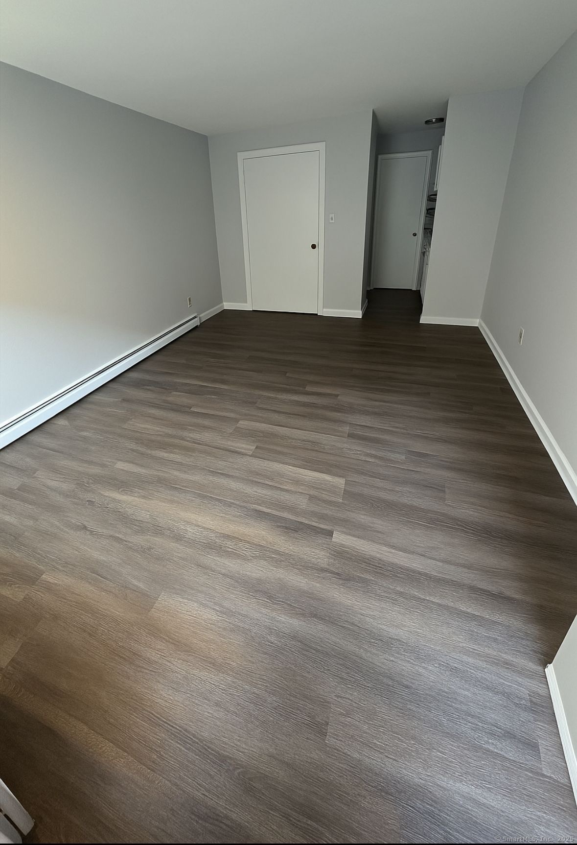 165 McKinley Avenue, Unit 8A Bridgeport, CT 06606 - Photo 2 of 3 wooden floor in a room
