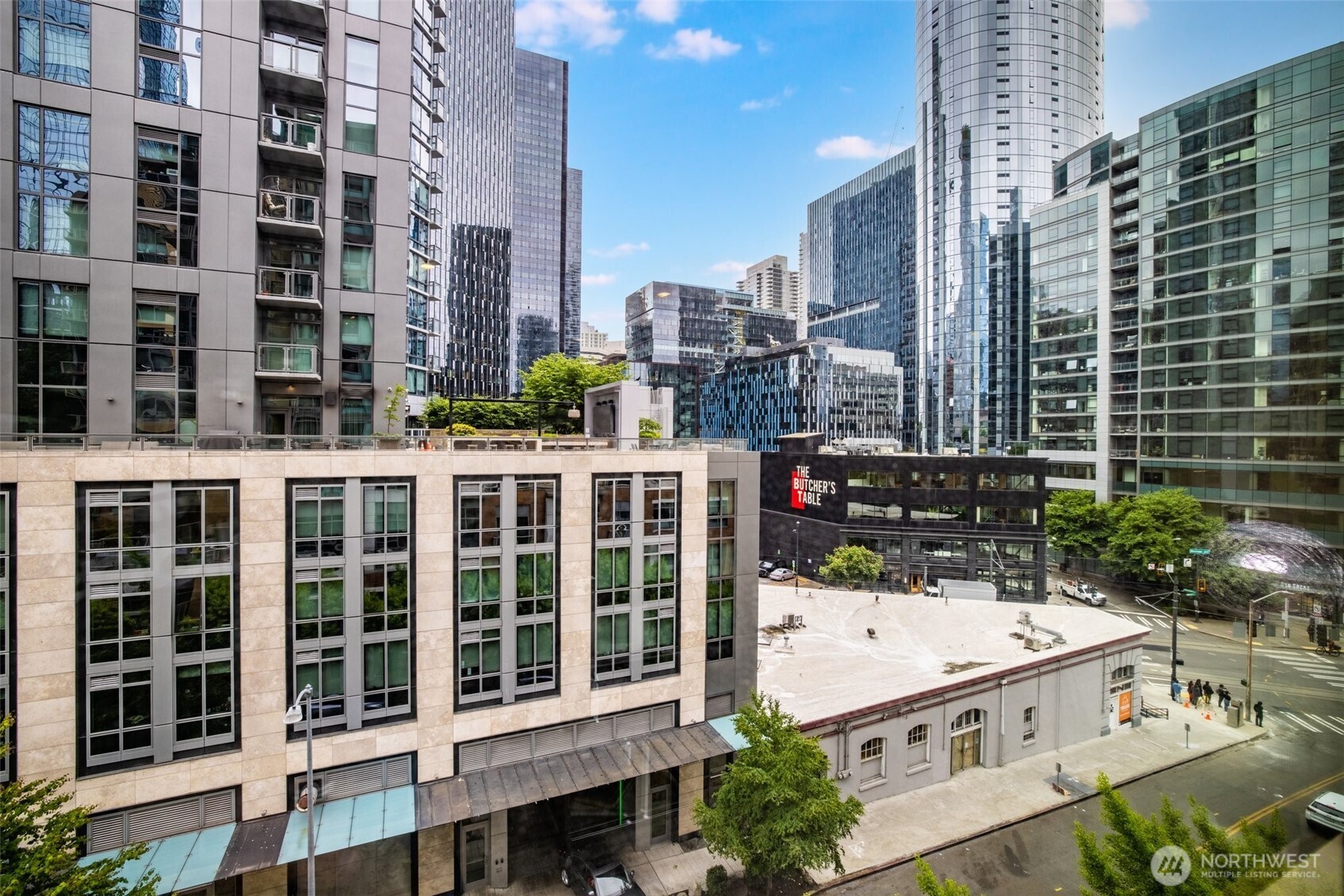900 Lenora Street, Unit W402 Seattle, WA 98121 - Photo 15 of 39 a view of building with a garden