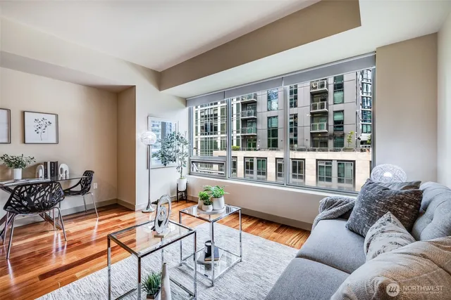 a living room with furniture and a window