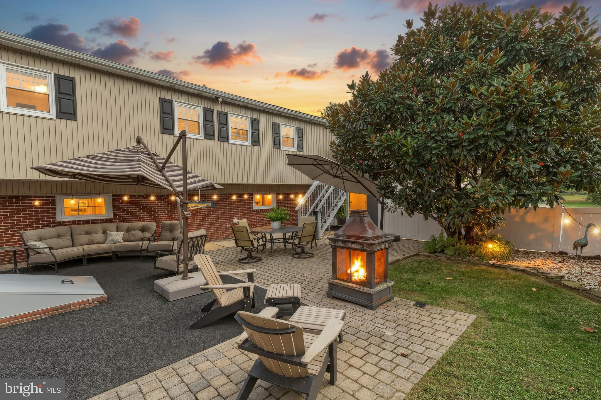 372 Maple Avenue Hanover, PA 17331 - Photo 2 of 87 a view of a patio with table and chairs with a fire pit