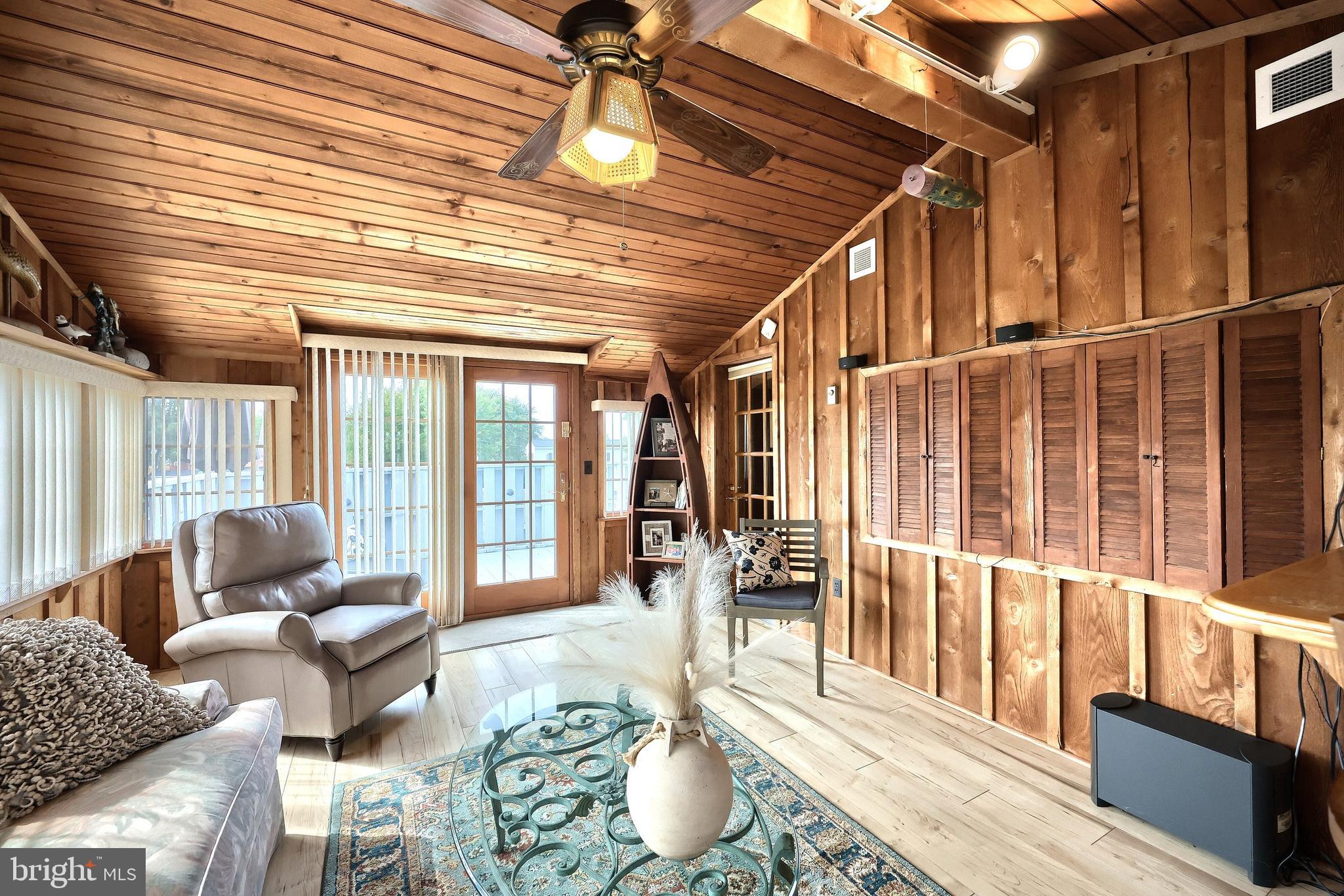 372 Maple Avenue Hanover, PA 17331 - Photo 27 of 87 a living room with furniture and a floor to ceiling window