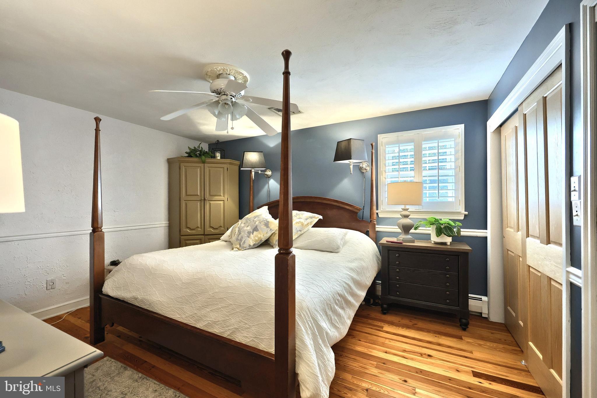 372 Maple Avenue Hanover, PA 17331 - Photo 28 of 87 a bedroom with a bed and a chandelier