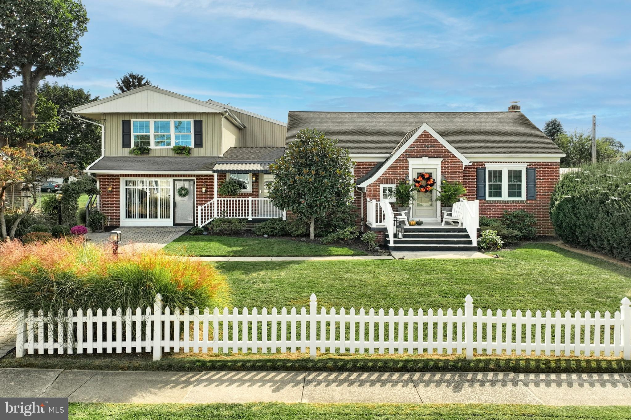 372 Maple Avenue Hanover, PA 17331 - Photo 4 of 87 a front view of a house with a garden