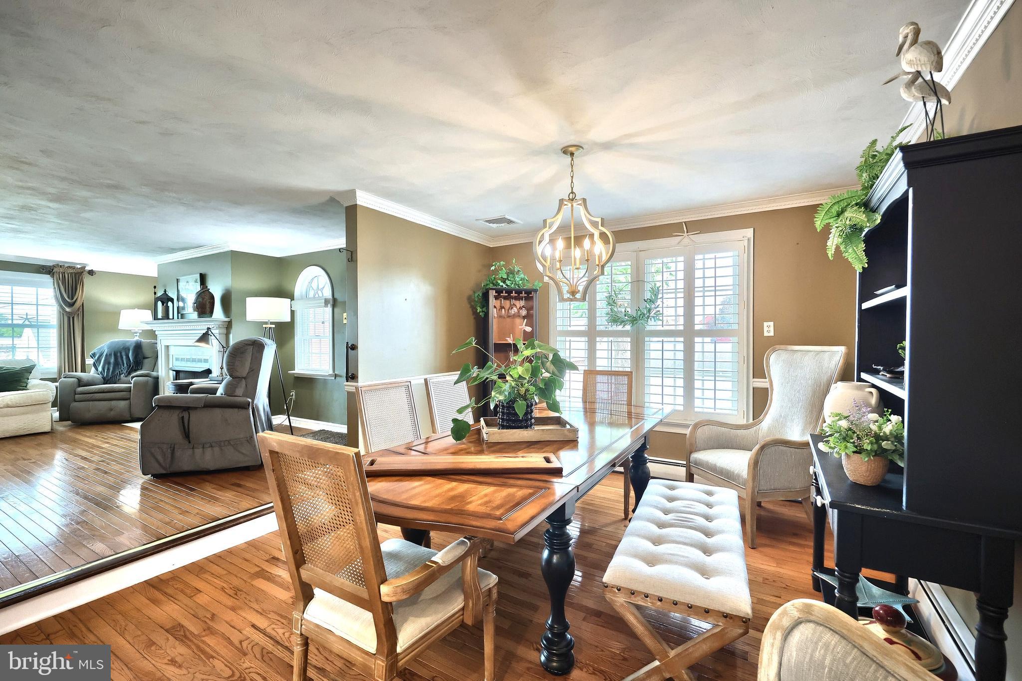 372 Maple Avenue Hanover, PA 17331 - Photo 44 of 87 a view of a dining room with furniture window and wooden floor