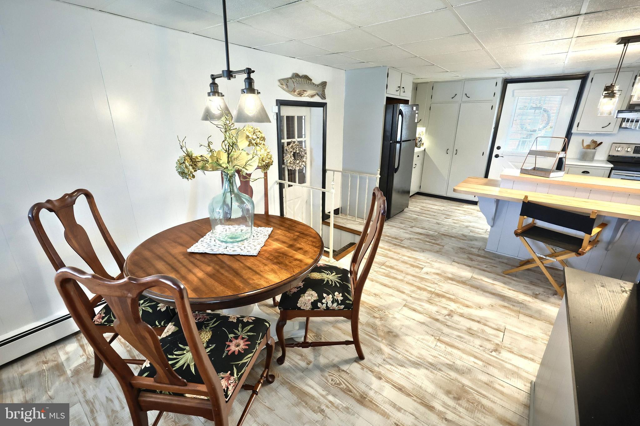 372 Maple Avenue Hanover, PA 17331 - Photo 57 of 87 a view of a dining room with furniture and a chandelier