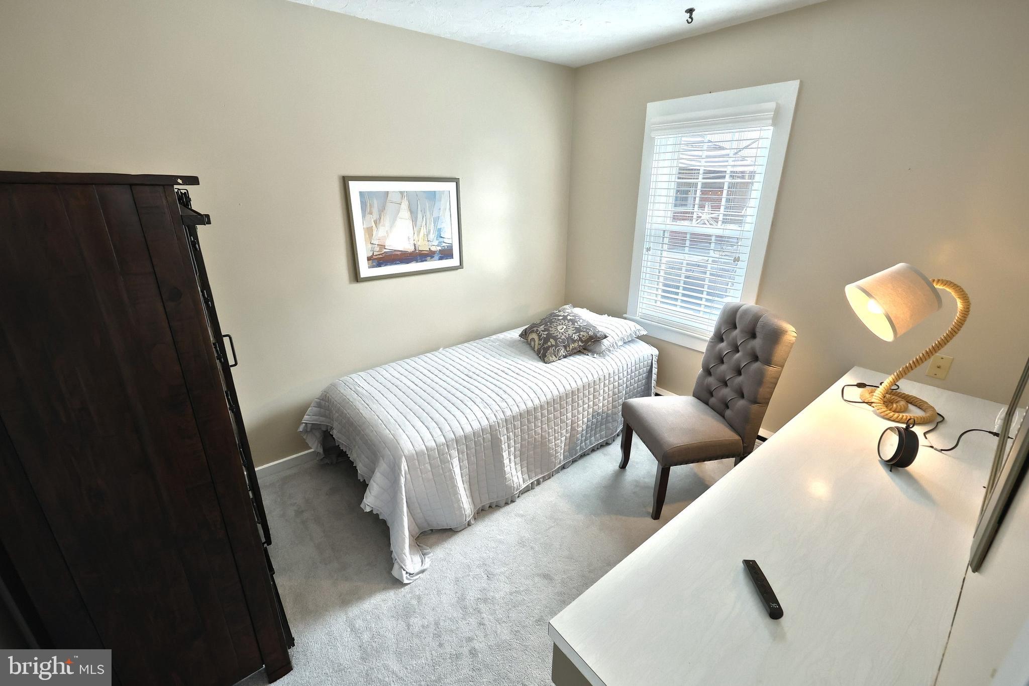 372 Maple Avenue Hanover, PA 17331 - Photo 66 of 87 a bedroom with a bed and wooden floor